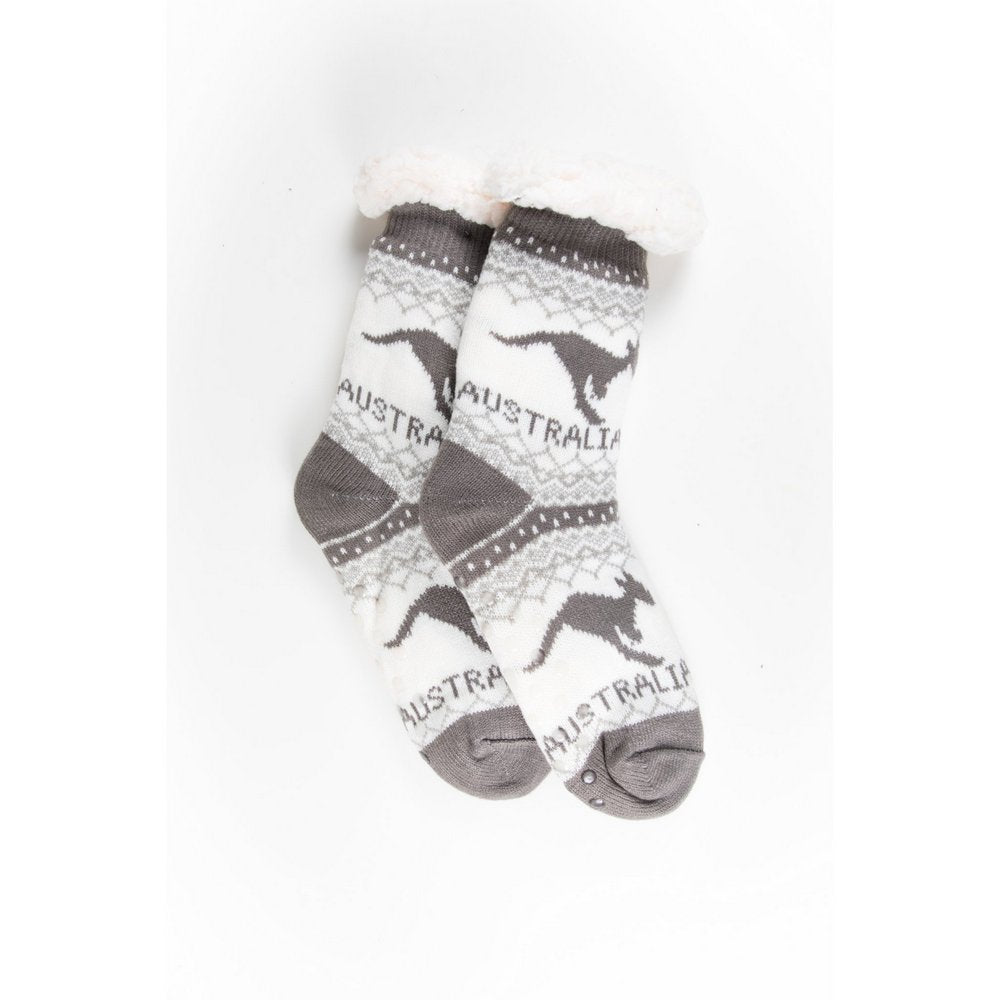 Cosy home socks for women with fluffy inner lining and non slip bottom in grey kangaroo print, flat lay showing length
