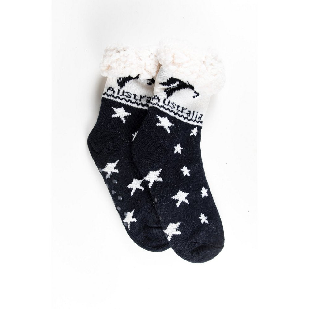 Cosy home socks for women with fluffy inner lining and non slip bottom in navy kangaroo print, flat lay showing length