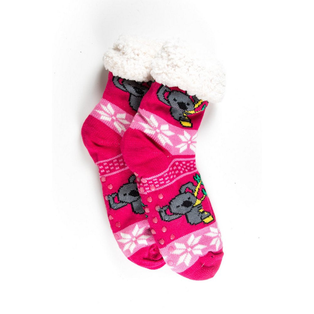 Cosy home socks for women with fluffy inner lining and non slip bottom in hot pink koala print, flat lay showing length