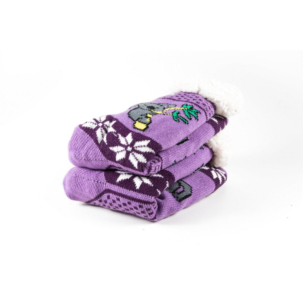 Cosy home socks for women with fluffy inner lining and non slip bottom in purple koala print, close up showing thickness
