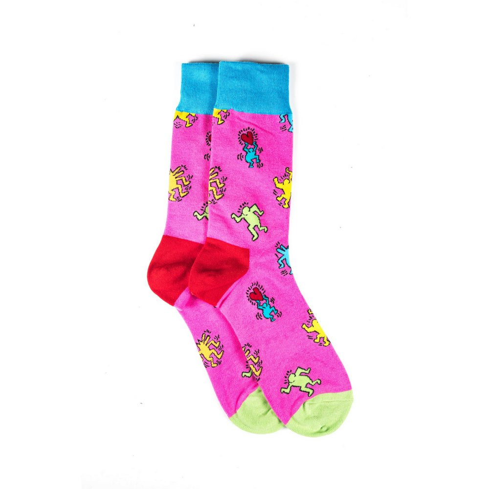 Funky novelty colourful socks for men and women in pink dancing people, vertical flat lay showing length