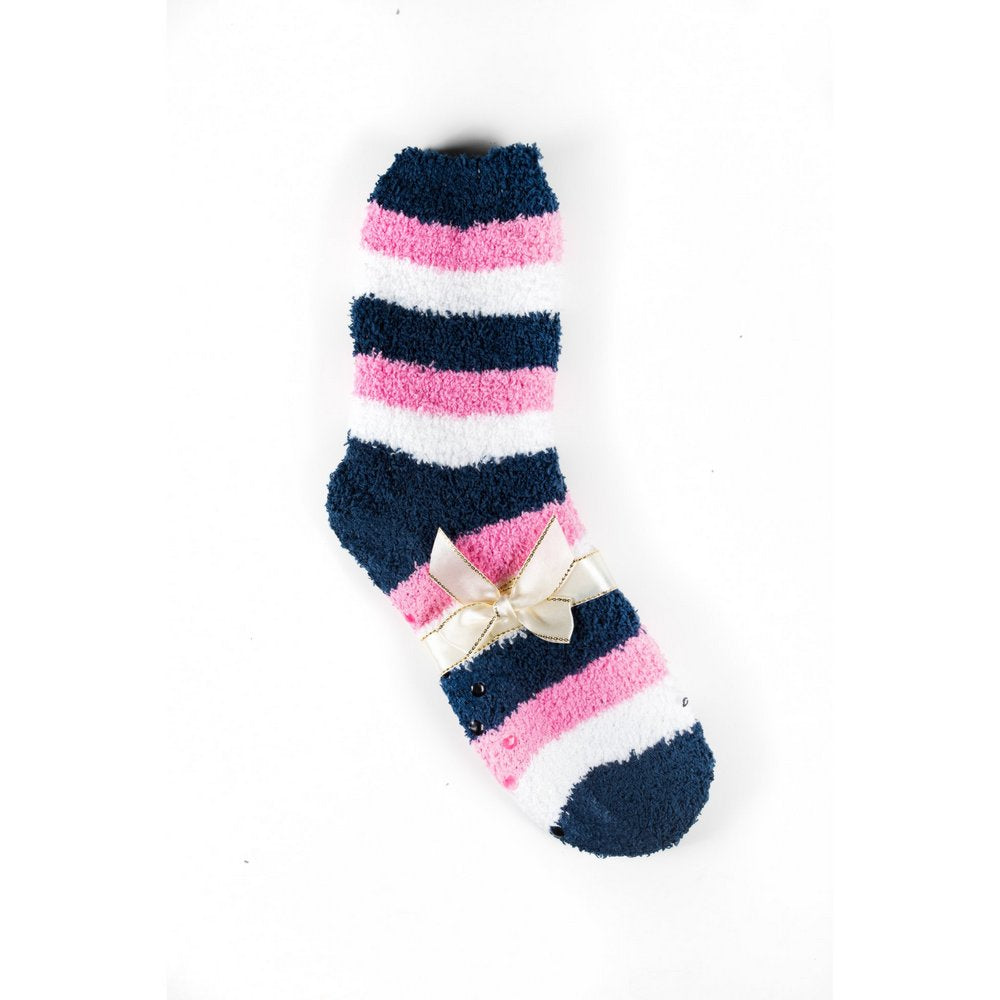 Cosy bed socks for women with non-slip bottoms in navy pink stripes, flat lay showing gift packaging