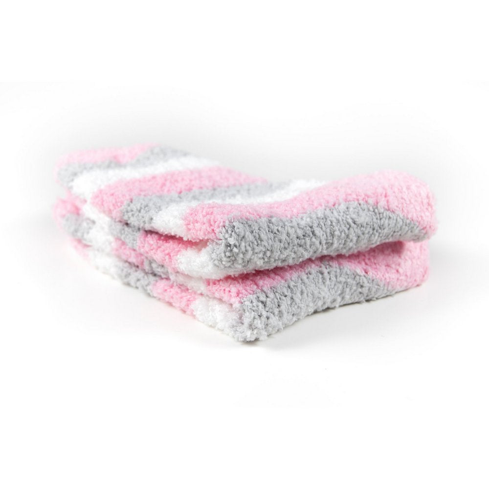 Cosy bed socks for women with non-slip bottoms in baby pink grey stripes, close up showing thickness